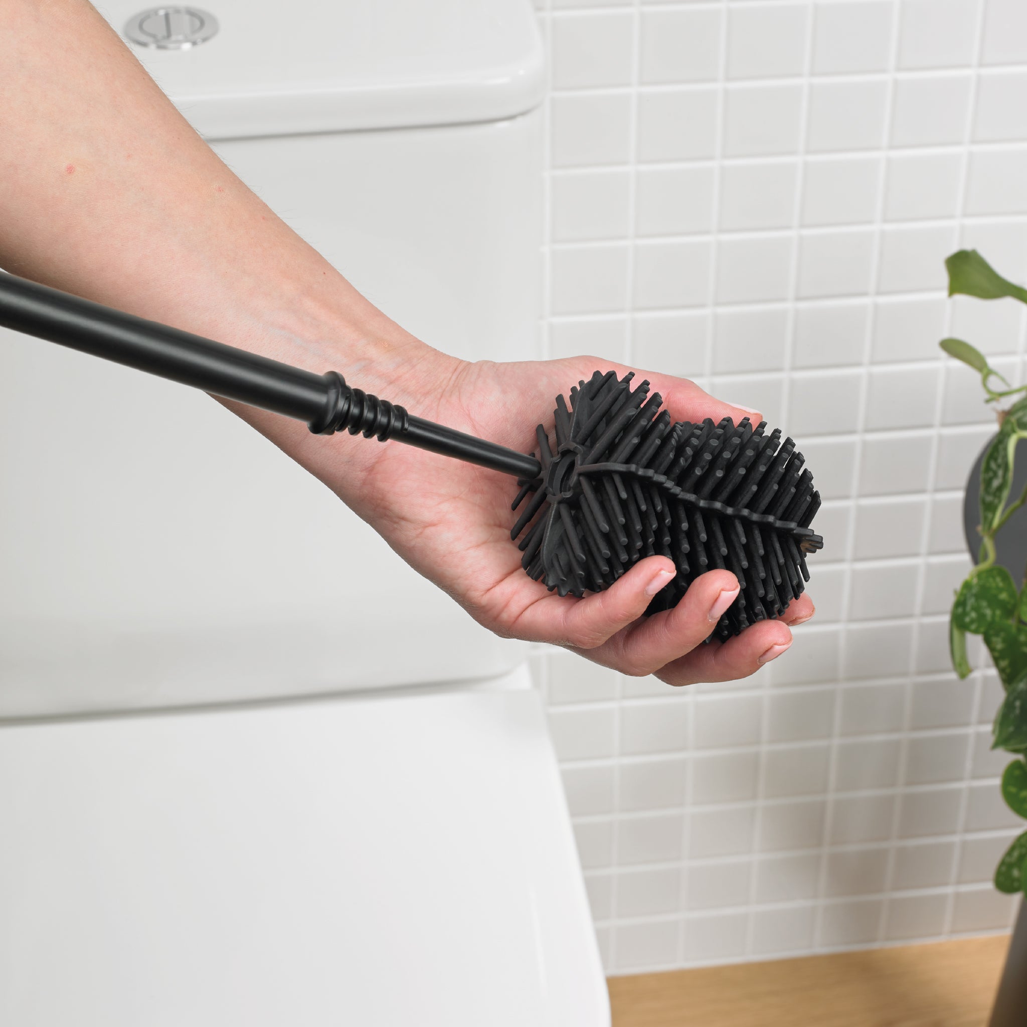 Durable black toilet brush head with dense bristles for effective, scratch-free cleaning.