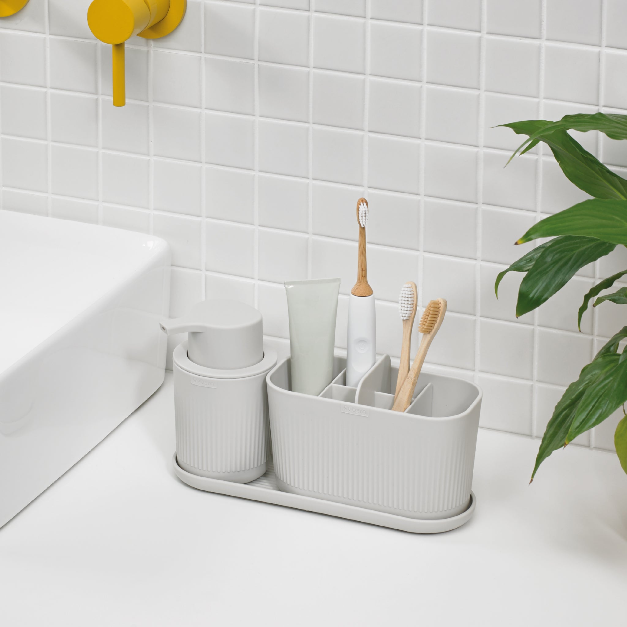Light grey bathroom tray with a modern ribbed design, keeping essentials organized and stylish.
