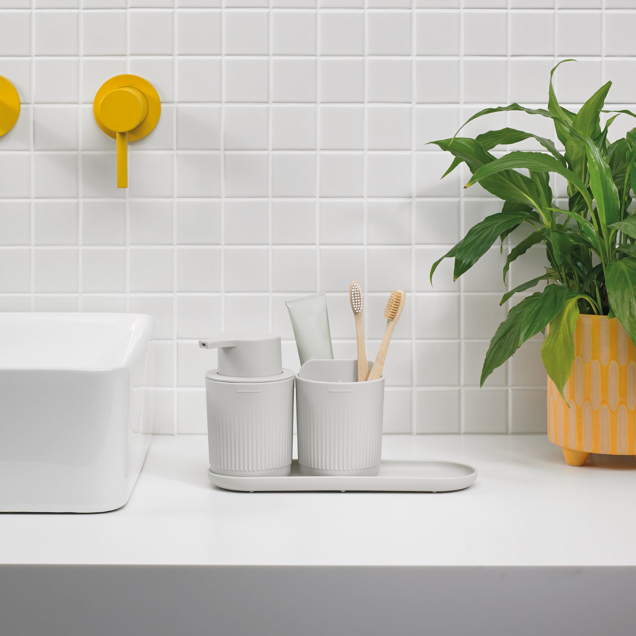 ReBorn ribbed bathroom set with soap dispenser, toothbrush holder, and tray—stylish, minimal, and organized.