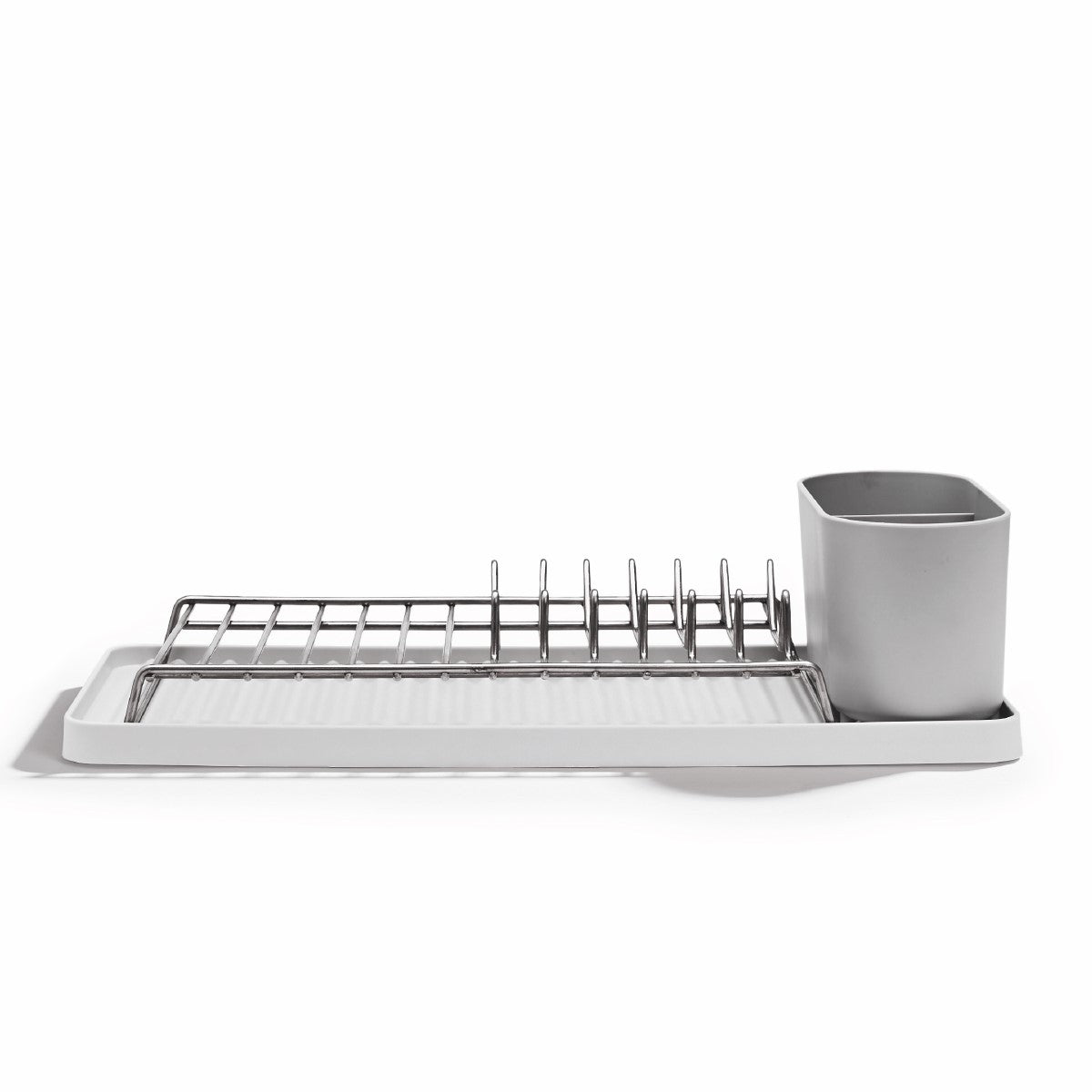 Compact dish drying rack with recycled base, space-saving design, and dedicated utensil holder.