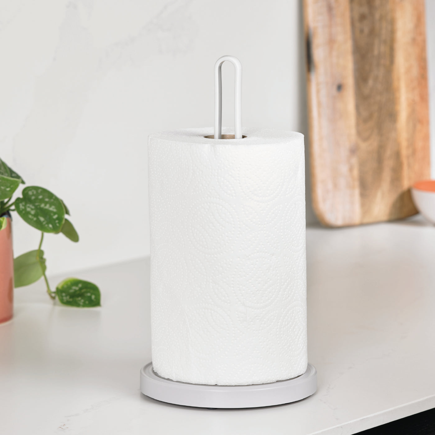 Eco-friendly kitchen roll holder made from recycled materials, featuring a minimalist, modern design.