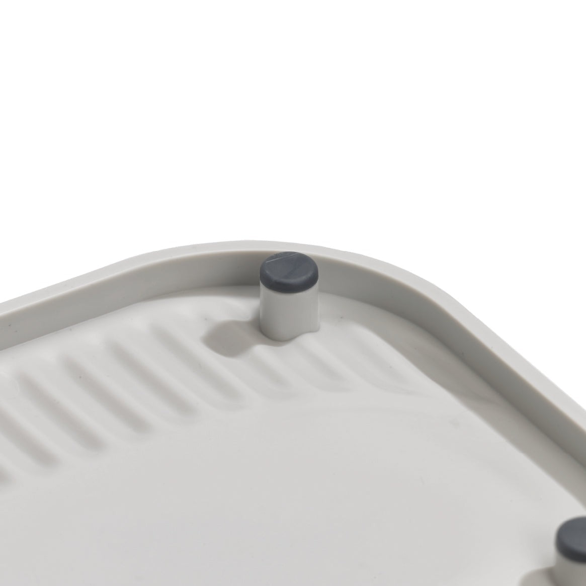 Recycled plastic sink tidy with non-slip feet and textured surface for secure, eco-friendly organization.