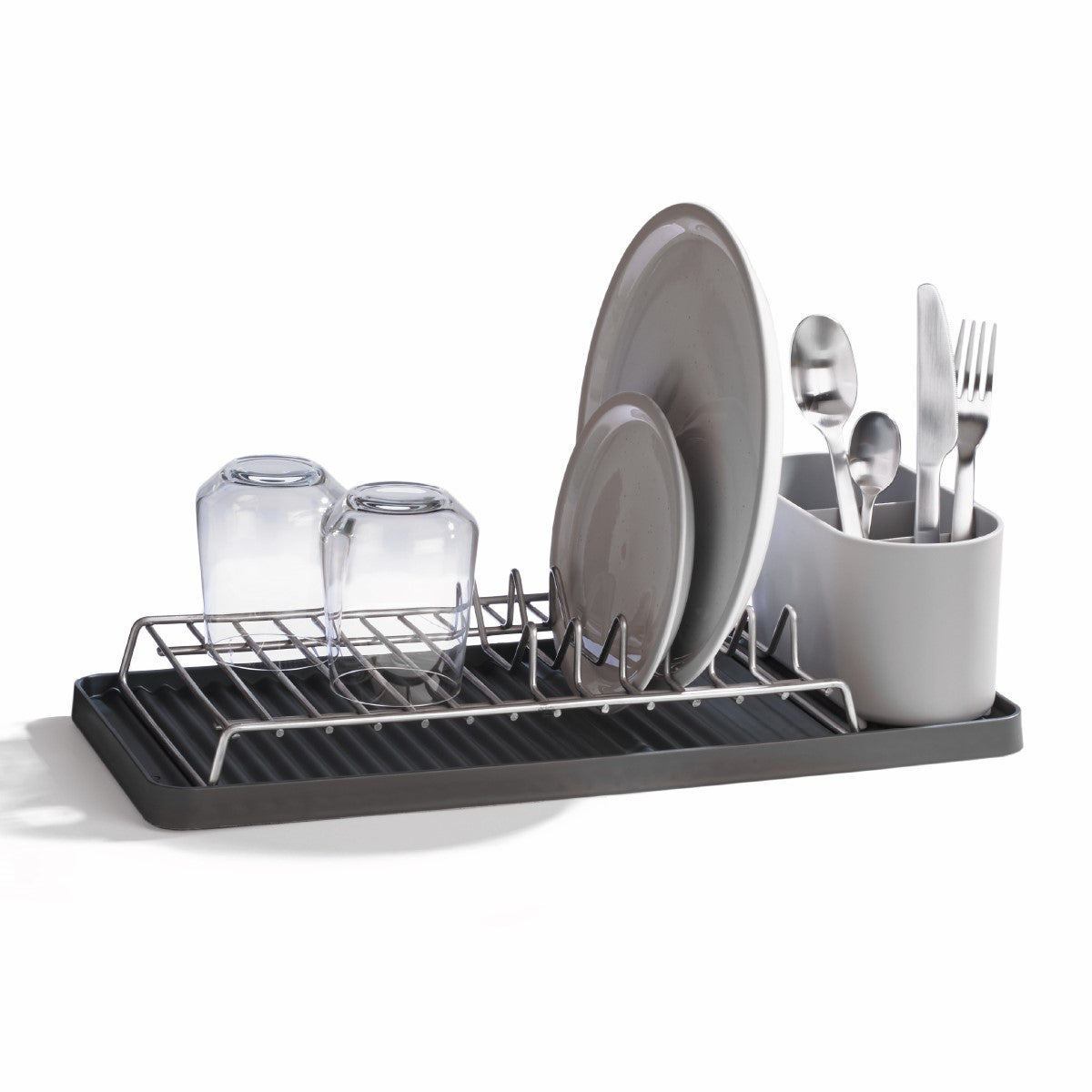 Compact dish drying rack made from recycled materials, with slots for plates, glasses, and utensils.