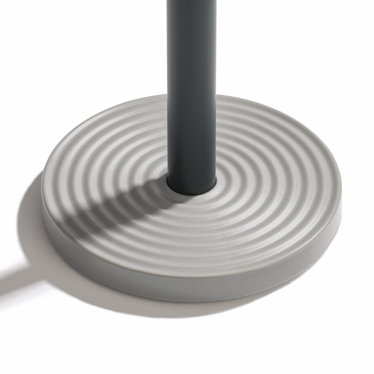 Recycled kitchen roll holder with a modern rippled base—eco-friendly, sturdy, and stylish.