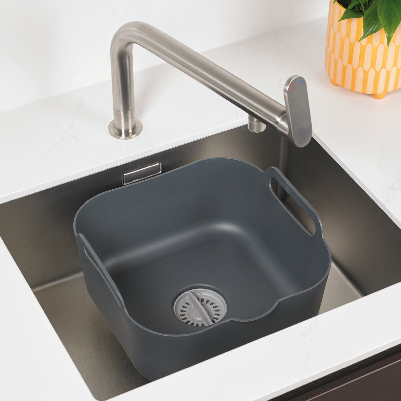 Recycled washing up bowl with drainage hole, eco-friendly design, and an easy-carry handle.