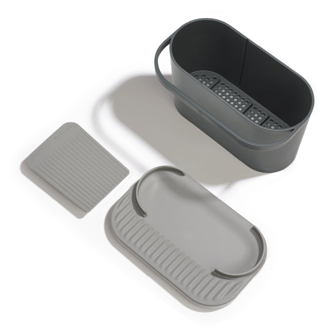 Recycled kitchen sink tidy with drainage base, sleek grey design, and handle for easy carrying.