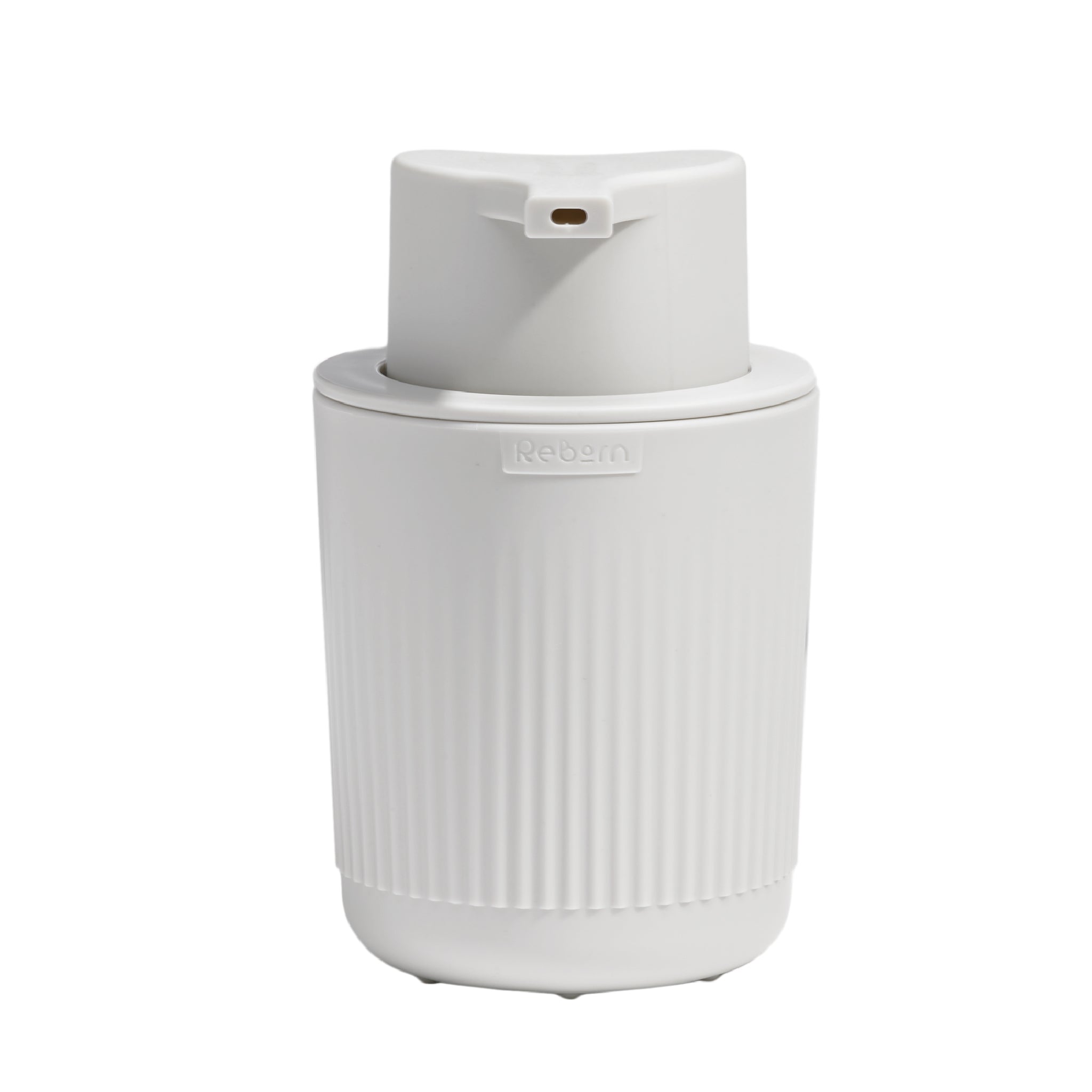 Modern white soap dispenser with ribbed texture, matte finish, and integrated pump for effortless dispensing.