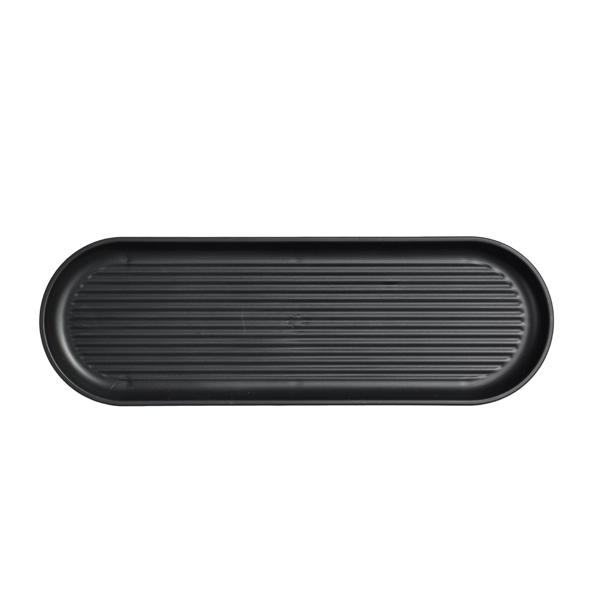 Sleek black ribbed bathroom tray, perfect for organizing toiletries with a modern touch.