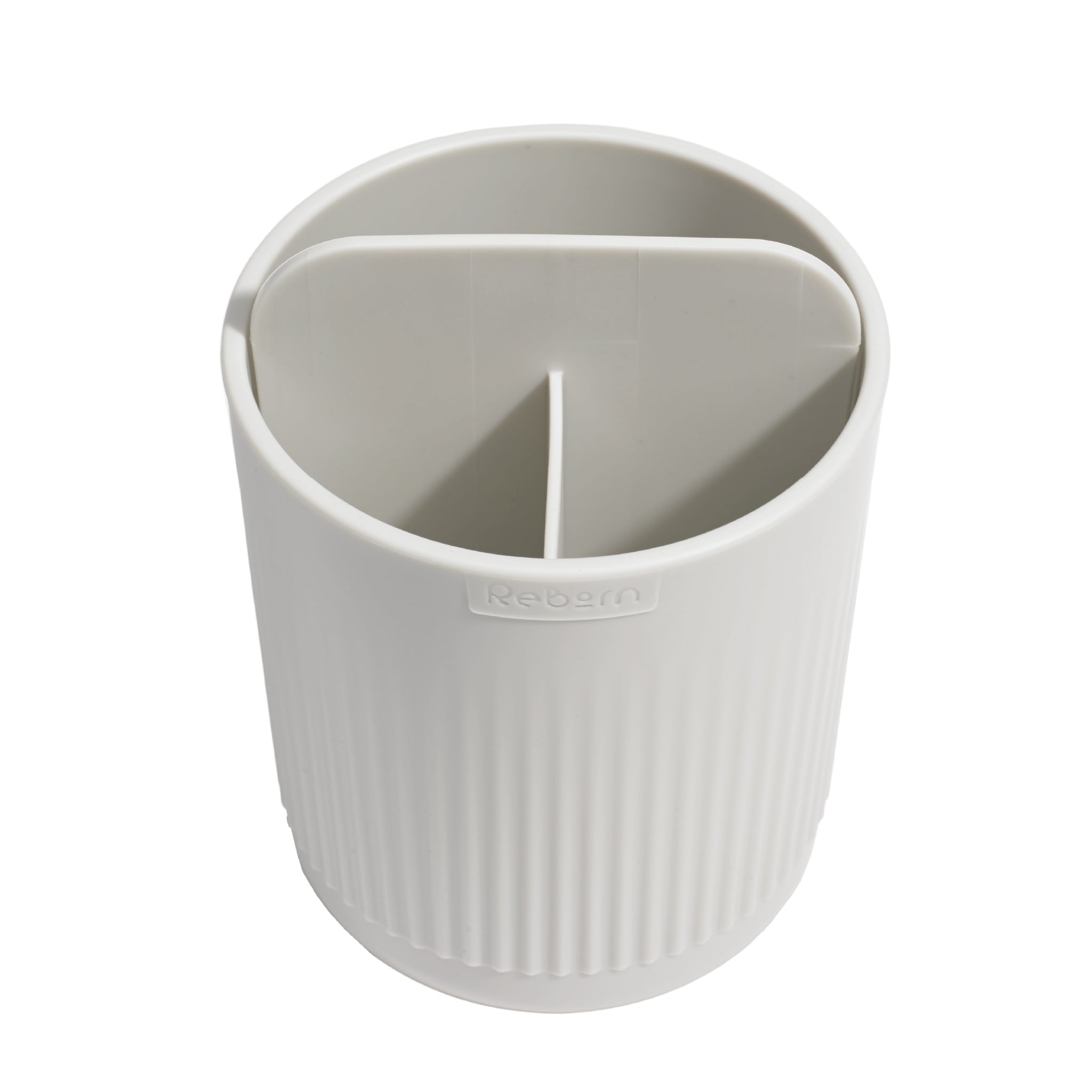 ReBorn toothbrush holder with ribbed design, multi-section interior for organized, clutter-free storage.