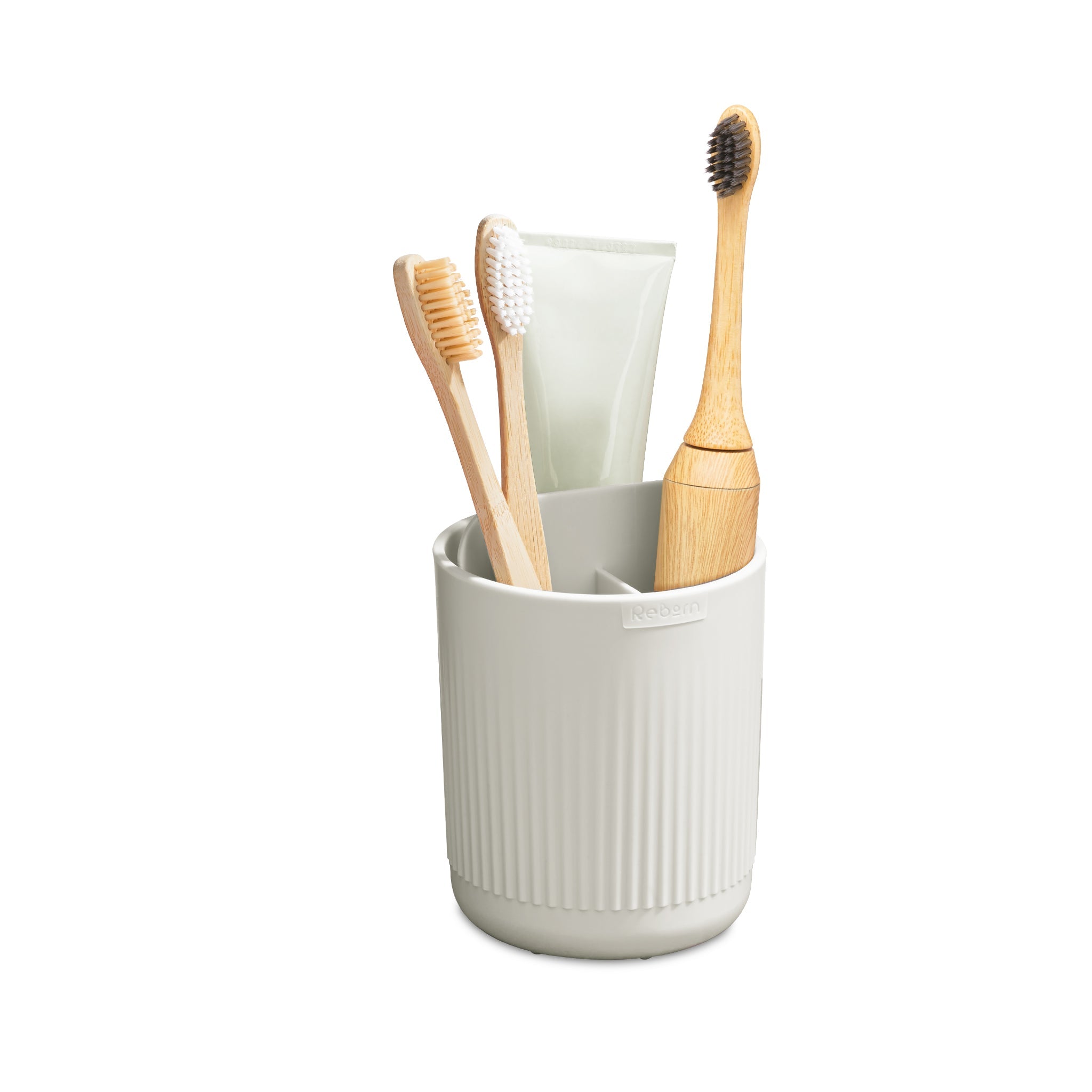 Modern ribbed toothbrush holder, minimalist design, fits multiple items for an organized bathroom.