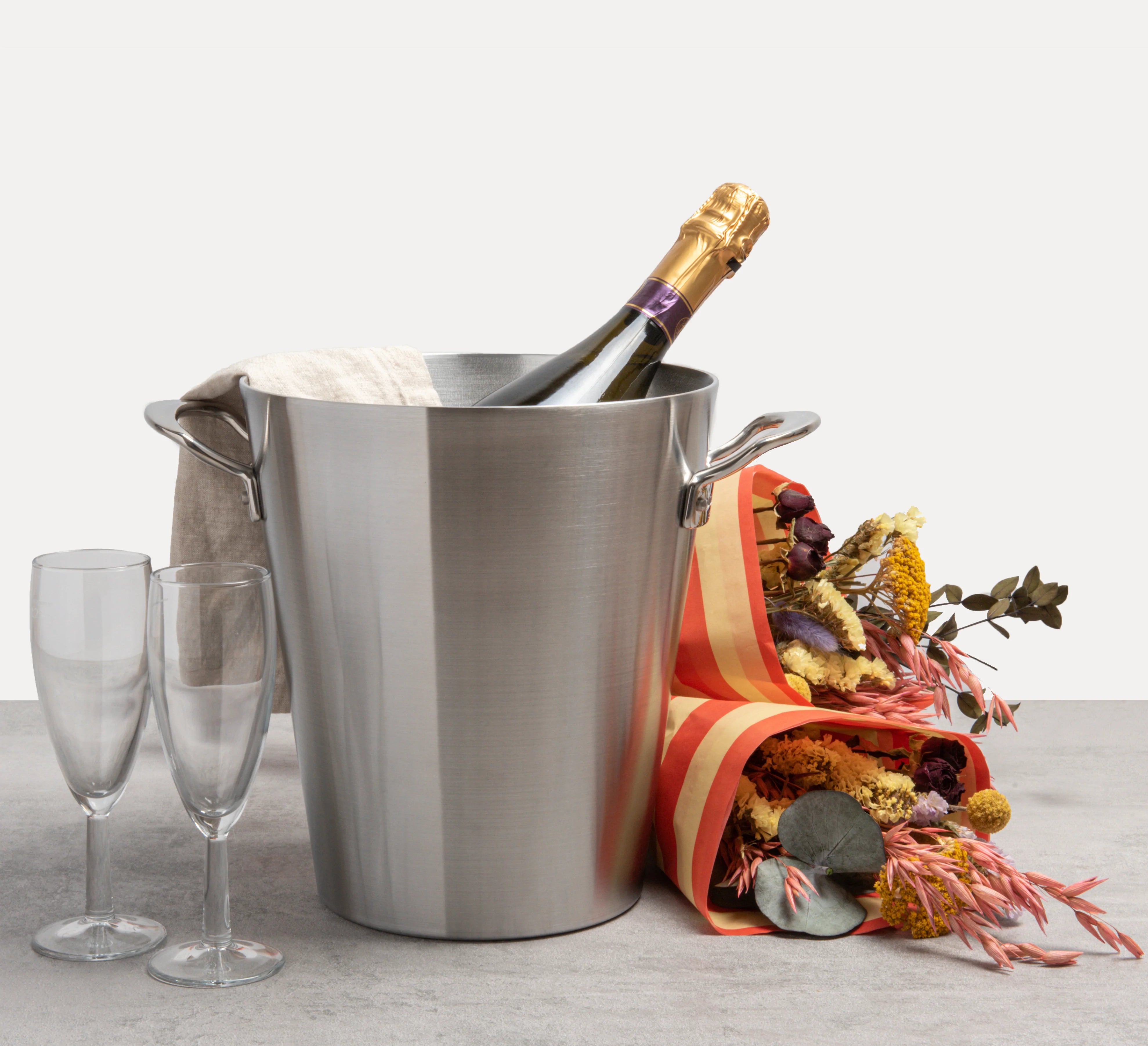 High quality champagne bucket with bottle, glasses and flowers