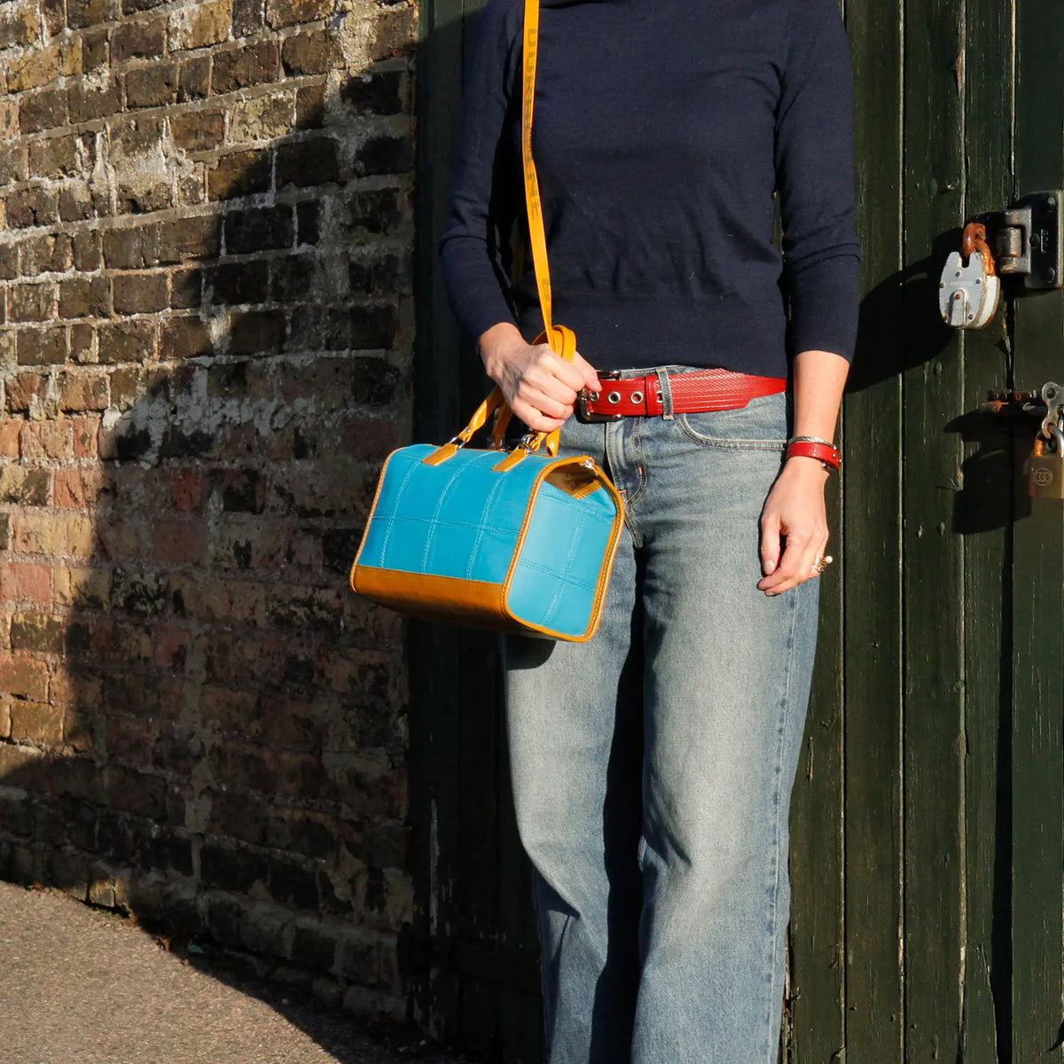 Elvis & Kresse small post bag carried, lifestyle