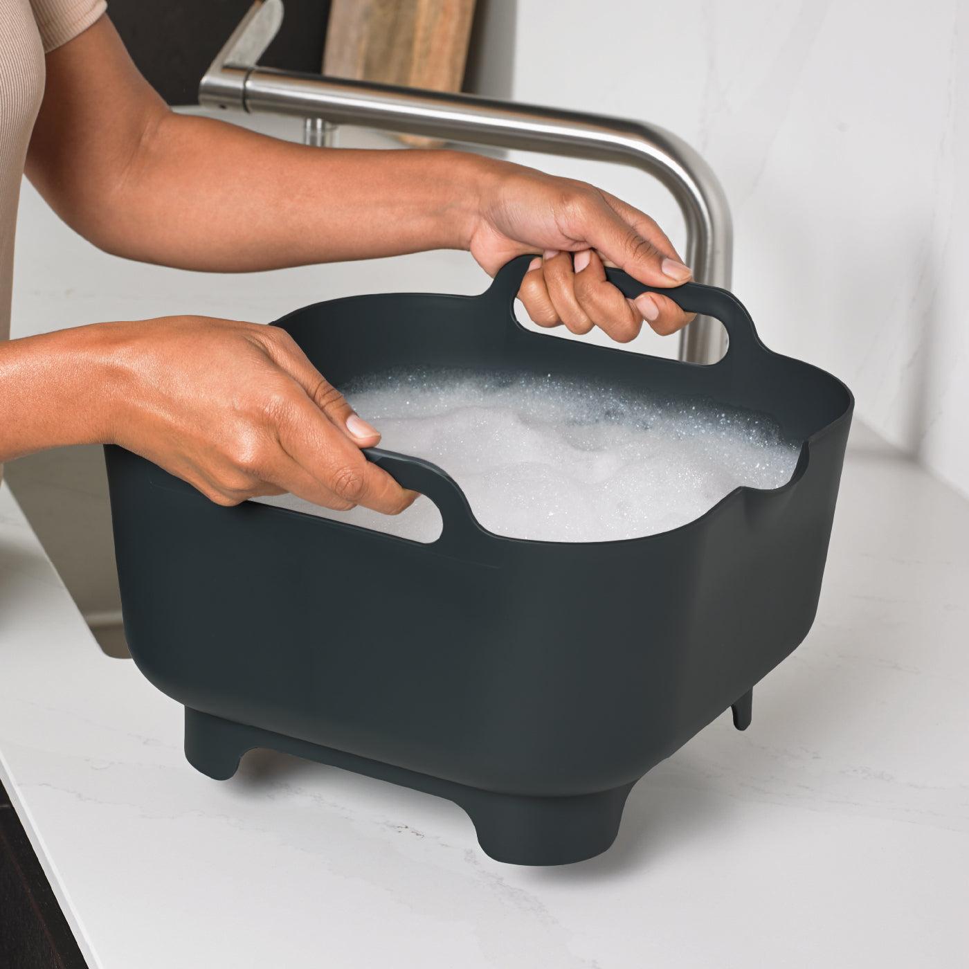 Sturdy recycled washing up bowl with handles and feet for stability, eco-friendly and easy to carry.