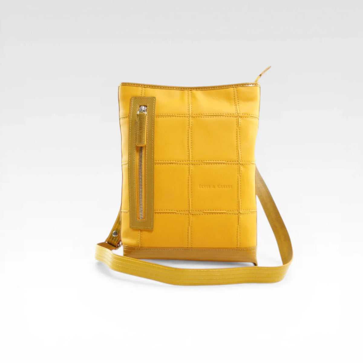 Elvis & Kresse reporter bag in yellow rescued leather with fire-hose