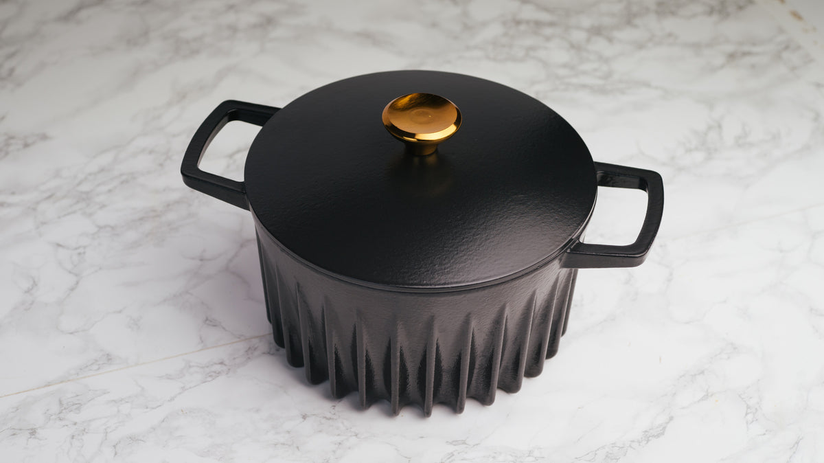 FIREUP black Dutch oven on marble
