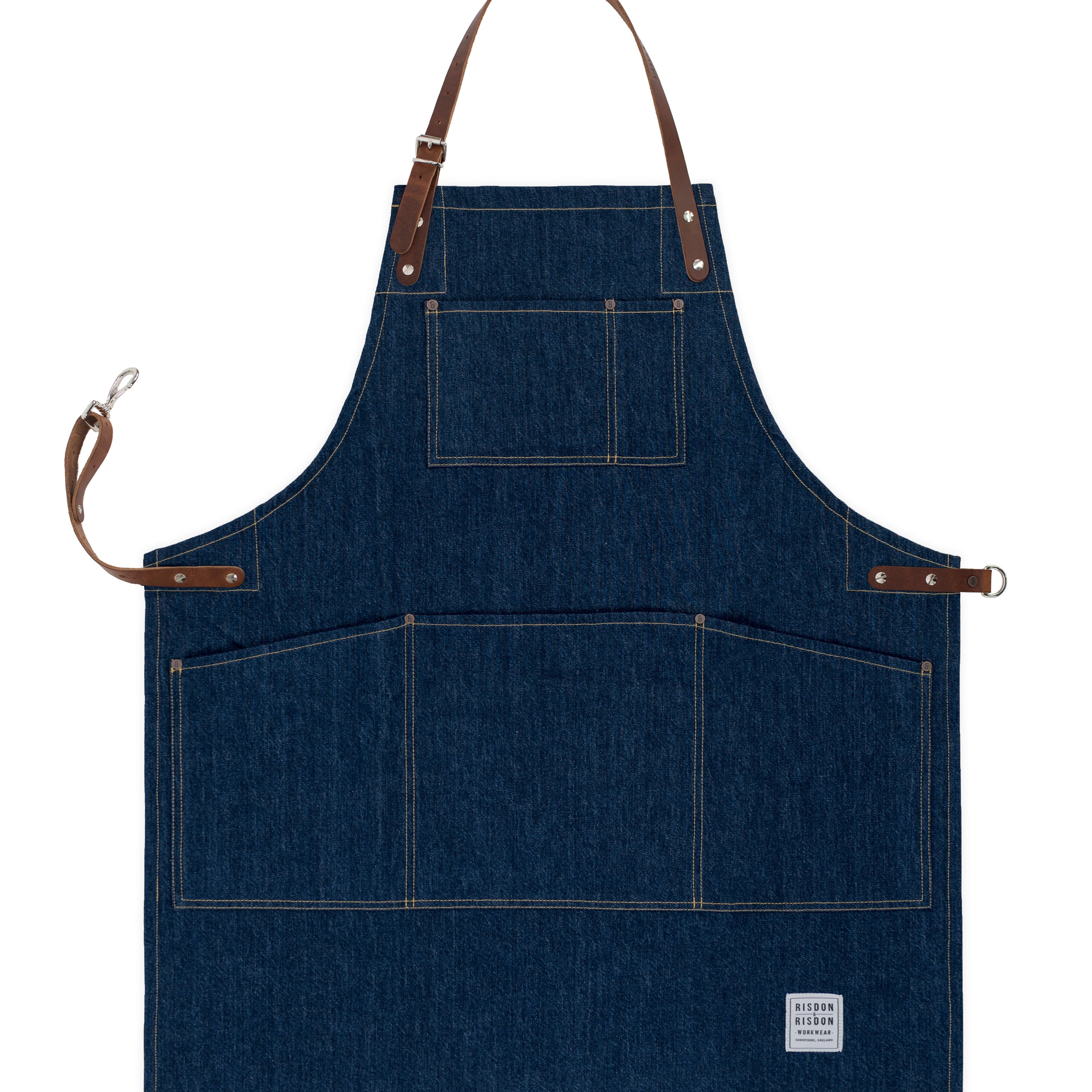 Handcrafted, denim apron; made in Britain with pockets and removable leather straps.