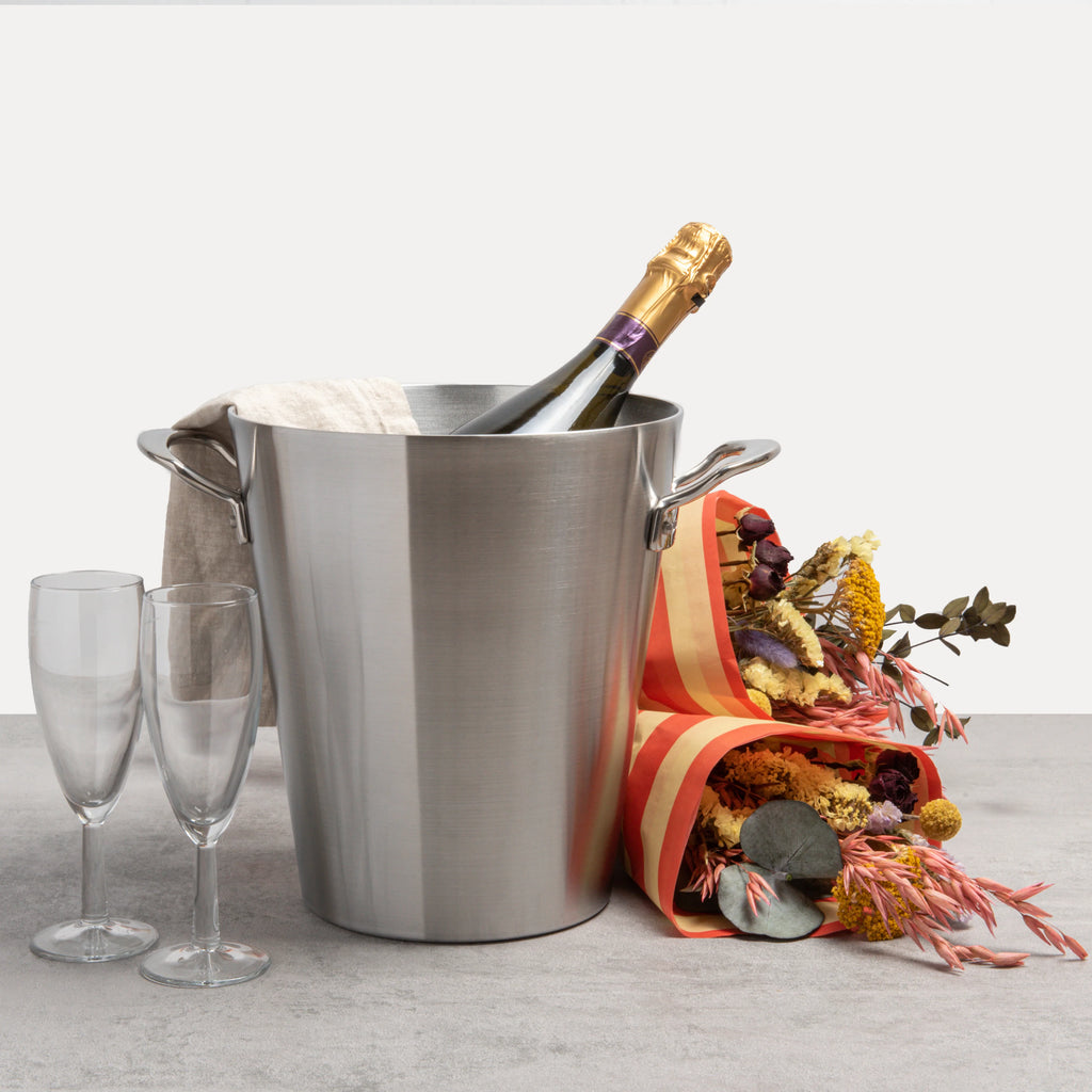 High quality champagne bucket with bottle, glasses and flowers