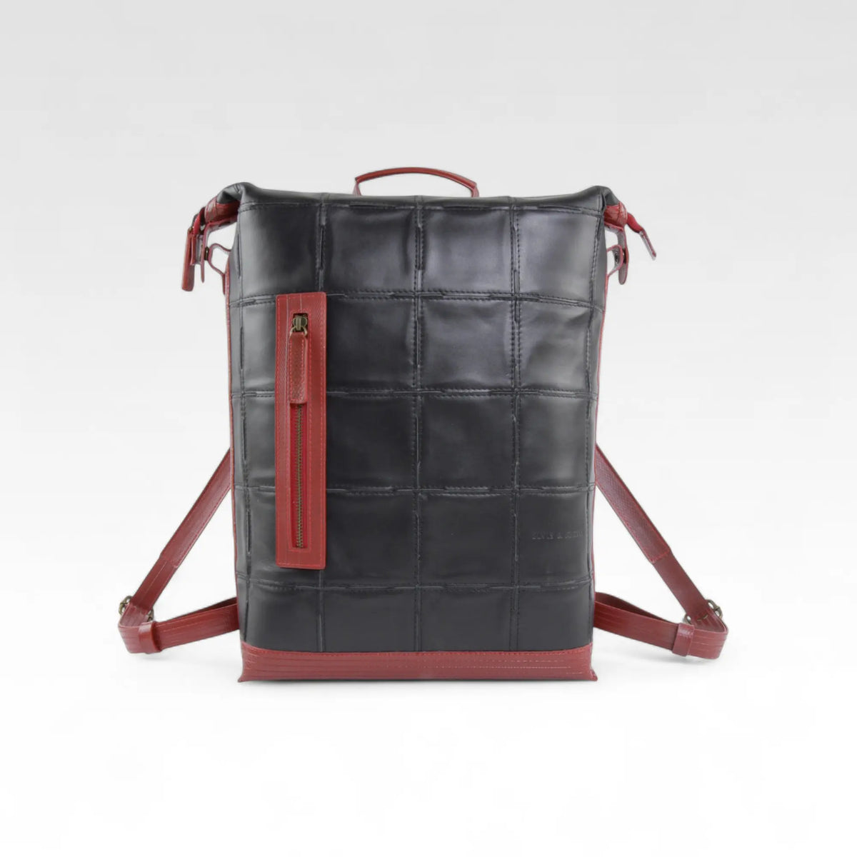 Elvis & Kresse large backpack in black and red rescued leather with fire-hose