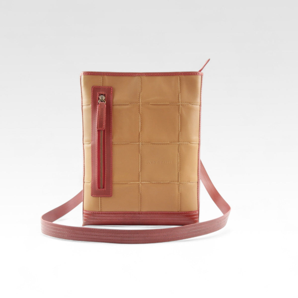 Elvis & Kresse reporter bag in Oak rescued leather with fire-hose